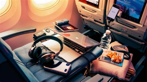 Can you listen to music on a plane? And what are the cultural differences in airplane entertainment?